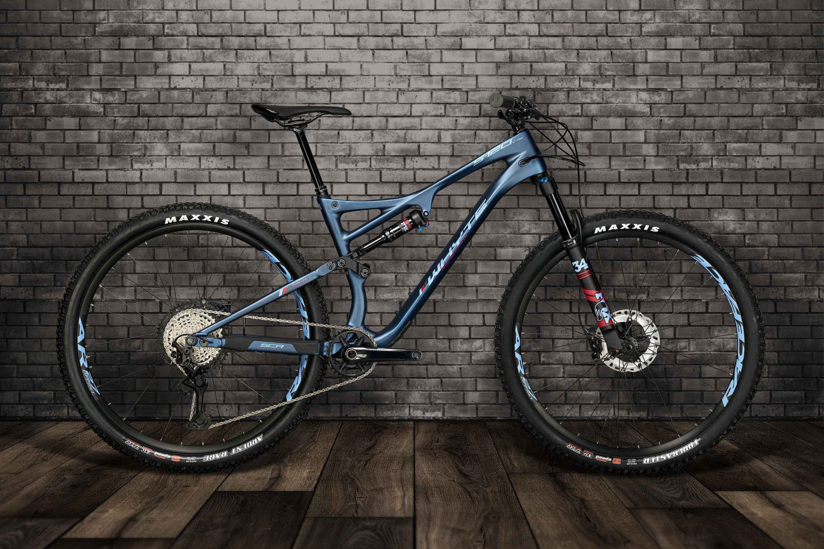 The Whyte S-120C-RS mountain bike against a brick wall by Matthew Brown Photography